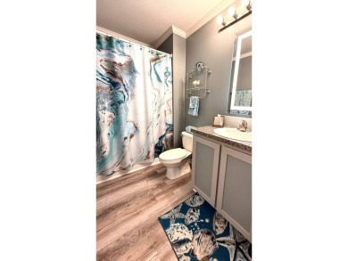 You've just discovered a REAL GEM -- a move-in ready paradise on Royal Wood Golf and Country Club in Florida - for sale on GolfHomes.com, golf home, golf lot
