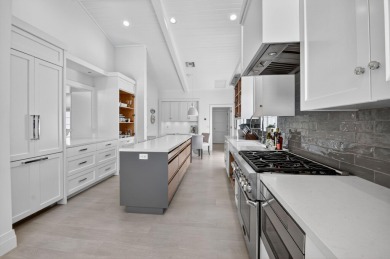 This contemporary home  is truly one of a kind, offering a WOW on Bocaire Country Club in Florida - for sale on GolfHomes.com, golf home, golf lot