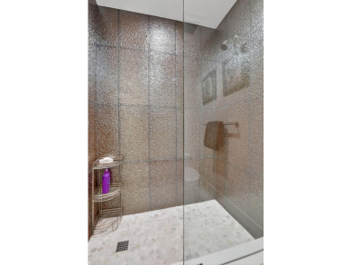 This contemporary home  is truly one of a kind, offering a WOW on Bocaire Country Club in Florida - for sale on GolfHomes.com, golf home, golf lot