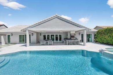 This contemporary home  is truly one of a kind, offering a WOW on Bocaire Country Club in Florida - for sale on GolfHomes.com, golf home, golf lot