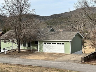 This beautifully updated home offers a prime golf course setting on Holiday Island Executive Golf Course in Arkansas - for sale on GolfHomes.com, golf home, golf lot