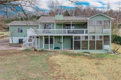 This beautifully updated home offers a prime golf course setting on Holiday Island Executive Golf Course in Arkansas - for sale on GolfHomes.com, golf home, golf lot