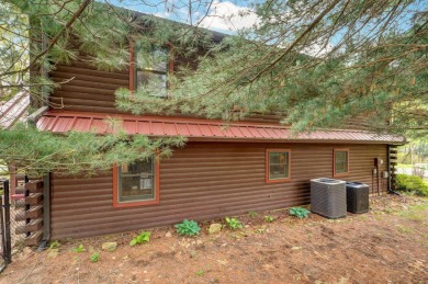 One-of-a-Kind Log Home - Walking Distance To Lake Taneycomo - on Thousand Hills Golf Resort in Missouri - for sale on GolfHomes.com, golf home, golf lot