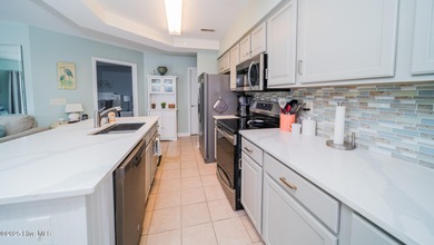 RARE FIND - GOLF FRONT GROUND FLOOR END UNIT CONDO in the on Brunswick Plantation and Golf Resorts in North Carolina - for sale on GolfHomes.com, golf home, golf lot