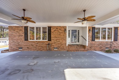 Welcome to this stunning and meticulously maintained 4-bedroom on Santee-Cooper Country Club in South Carolina - for sale on GolfHomes.com, golf home, golf lot