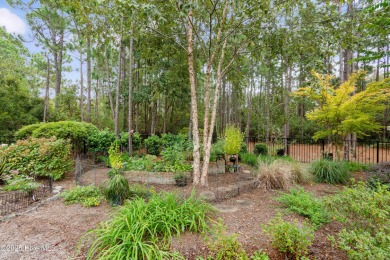 Step into luxury coastal living with this impeccable residence on Members Club At St. James Plantation in North Carolina - for sale on GolfHomes.com, golf home, golf lot