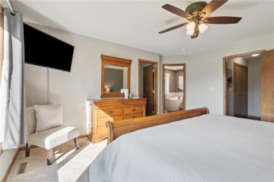 This stunning 4-bedroom, 2.5-bath home sits on a rare double lot on Hunters Ridge Golf Course in Iowa - for sale on GolfHomes.com, golf home, golf lot