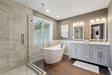 This stunning 4-bedroom, 2.5-bath home sits on a rare double lot on Hunters Ridge Golf Course in Iowa - for sale on GolfHomes.com, golf home, golf lot