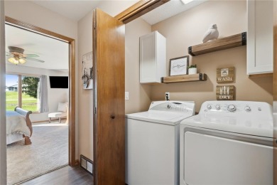 This stunning 4-bedroom, 2.5-bath home sits on a rare double lot on Hunters Ridge Golf Course in Iowa - for sale on GolfHomes.com, golf home, golf lot