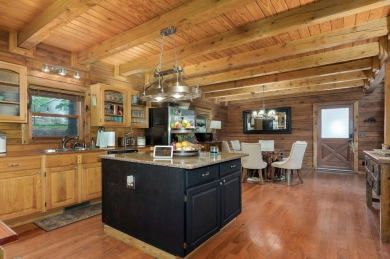 One-of-a-Kind Log Home - Walking Distance To Lake Taneycomo - on Thousand Hills Golf Resort in Missouri - for sale on GolfHomes.com, golf home, golf lot