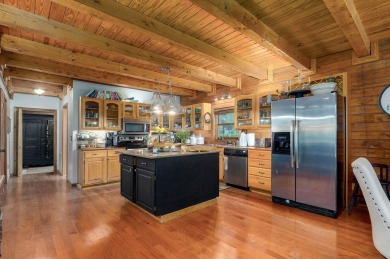 One-of-a-Kind Log Home - Walking Distance To Lake Taneycomo - on Thousand Hills Golf Resort in Missouri - for sale on GolfHomes.com, golf home, golf lot