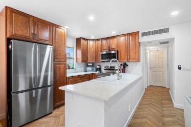 Gorgeous, updated, waterfront 2 bed 2 bath villa in highly on Kings Point Golf - Executive in Florida - for sale on GolfHomes.com, golf home, golf lot