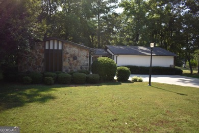 Welcome to your dream home overlooking Hole 2 of the prestigious on Honey Creek Country Club in Georgia - for sale on GolfHomes.com, golf home, golf lot