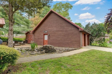 One-of-a-Kind Log Home - Walking Distance To Lake Taneycomo - on Thousand Hills Golf Resort in Missouri - for sale on GolfHomes.com, golf home, golf lot