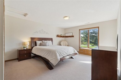 This stunning 4-bedroom, 2.5-bath home sits on a rare double lot on Hunters Ridge Golf Course in Iowa - for sale on GolfHomes.com, golf home, golf lot