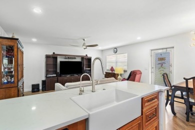 Gorgeous, updated, waterfront 2 bed 2 bath villa in highly on Kings Point Golf - Executive in Florida - for sale on GolfHomes.com, golf home, golf lot