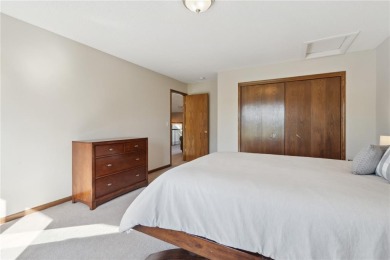 This stunning 4-bedroom, 2.5-bath home sits on a rare double lot on Hunters Ridge Golf Course in Iowa - for sale on GolfHomes.com, golf home, golf lot