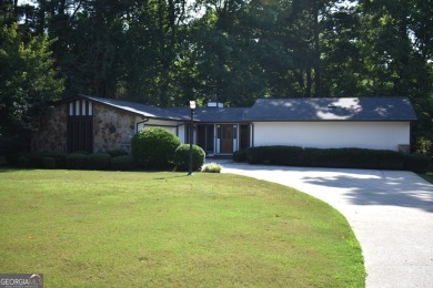 Welcome to your dream home overlooking Hole 2 of the prestigious on Honey Creek Country Club in Georgia - for sale on GolfHomes.com, golf home, golf lot