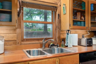One-of-a-Kind Log Home - Walking Distance To Lake Taneycomo - on Thousand Hills Golf Resort in Missouri - for sale on GolfHomes.com, golf home, golf lot
