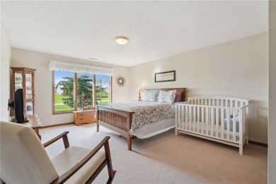 This stunning 4-bedroom, 2.5-bath home sits on a rare double lot on Hunters Ridge Golf Course in Iowa - for sale on GolfHomes.com, golf home, golf lot