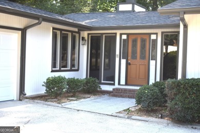 Welcome to your dream home overlooking Hole 2 of the prestigious on Honey Creek Country Club in Georgia - for sale on GolfHomes.com, golf home, golf lot