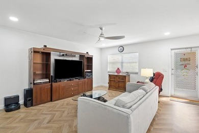 Gorgeous, updated, waterfront 2 bed 2 bath villa in highly on Kings Point Golf - Executive in Florida - for sale on GolfHomes.com, golf home, golf lot