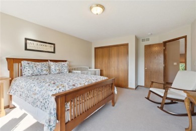 This stunning 4-bedroom, 2.5-bath home sits on a rare double lot on Hunters Ridge Golf Course in Iowa - for sale on GolfHomes.com, golf home, golf lot