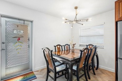 Gorgeous, updated, waterfront 2 bed 2 bath villa in highly on Kings Point Golf - Executive in Florida - for sale on GolfHomes.com, golf home, golf lot