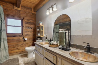 One-of-a-Kind Log Home - Walking Distance To Lake Taneycomo - on Thousand Hills Golf Resort in Missouri - for sale on GolfHomes.com, golf home, golf lot