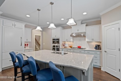 Step into luxury coastal living with this impeccable residence on Members Club At St. James Plantation in North Carolina - for sale on GolfHomes.com, golf home, golf lot