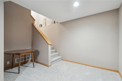 This stunning 4-bedroom, 2.5-bath home sits on a rare double lot on Hunters Ridge Golf Course in Iowa - for sale on GolfHomes.com, golf home, golf lot
