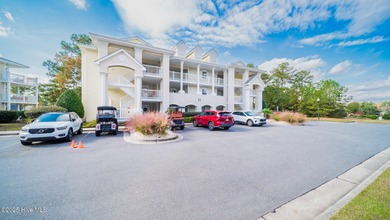 RARE FIND - GOLF FRONT GROUND FLOOR END UNIT CONDO in the on Brunswick Plantation and Golf Resorts in North Carolina - for sale on GolfHomes.com, golf home, golf lot