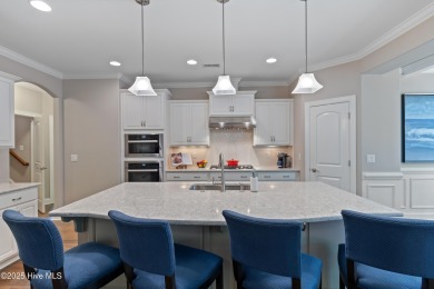 Step into luxury coastal living with this impeccable residence on Members Club At St. James Plantation in North Carolina - for sale on GolfHomes.com, golf home, golf lot