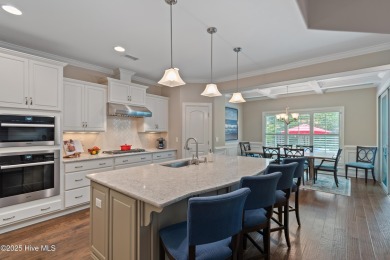 Step into luxury coastal living with this impeccable residence on Members Club At St. James Plantation in North Carolina - for sale on GolfHomes.com, golf home, golf lot