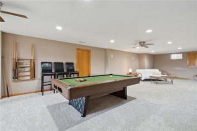 This stunning 4-bedroom, 2.5-bath home sits on a rare double lot on Hunters Ridge Golf Course in Iowa - for sale on GolfHomes.com, golf home, golf lot