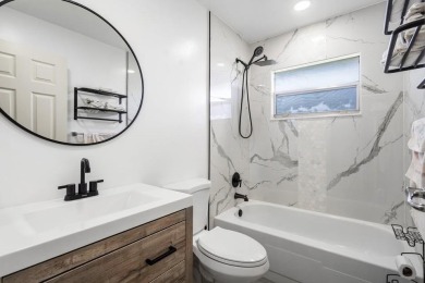 Gorgeous, updated, waterfront 2 bed 2 bath villa in highly on Kings Point Golf - Executive in Florida - for sale on GolfHomes.com, golf home, golf lot