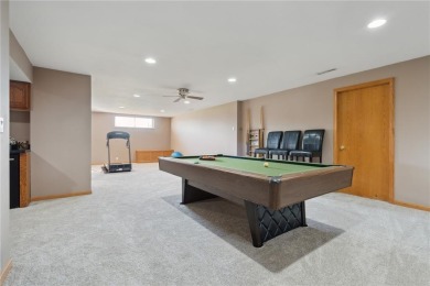 This stunning 4-bedroom, 2.5-bath home sits on a rare double lot on Hunters Ridge Golf Course in Iowa - for sale on GolfHomes.com, golf home, golf lot