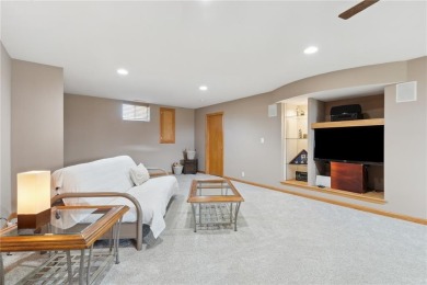 This stunning 4-bedroom, 2.5-bath home sits on a rare double lot on Hunters Ridge Golf Course in Iowa - for sale on GolfHomes.com, golf home, golf lot