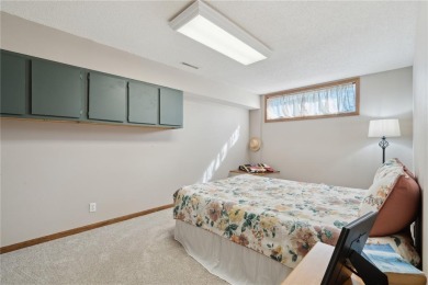 This stunning 4-bedroom, 2.5-bath home sits on a rare double lot on Hunters Ridge Golf Course in Iowa - for sale on GolfHomes.com, golf home, golf lot