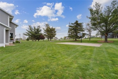 This stunning 4-bedroom, 2.5-bath home sits on a rare double lot on Hunters Ridge Golf Course in Iowa - for sale on GolfHomes.com, golf home, golf lot