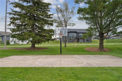 This stunning 4-bedroom, 2.5-bath home sits on a rare double lot on Hunters Ridge Golf Course in Iowa - for sale on GolfHomes.com, golf home, golf lot