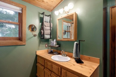 One-of-a-Kind Log Home - Walking Distance To Lake Taneycomo - on Thousand Hills Golf Resort in Missouri - for sale on GolfHomes.com, golf home, golf lot
