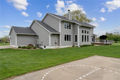 This stunning 4-bedroom, 2.5-bath home sits on a rare double lot on Hunters Ridge Golf Course in Iowa - for sale on GolfHomes.com, golf home, golf lot