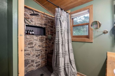 One-of-a-Kind Log Home - Walking Distance To Lake Taneycomo - on Thousand Hills Golf Resort in Missouri - for sale on GolfHomes.com, golf home, golf lot