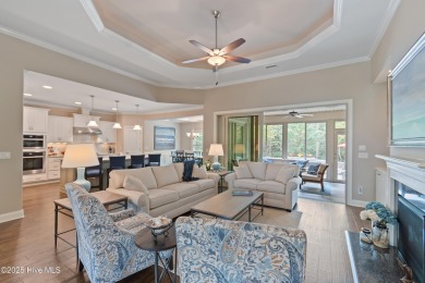 Step into luxury coastal living with this impeccable residence on Members Club At St. James Plantation in North Carolina - for sale on GolfHomes.com, golf home, golf lot