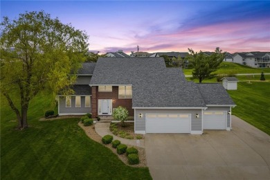 This stunning 4-bedroom, 2.5-bath home sits on a rare double lot on Hunters Ridge Golf Course in Iowa - for sale on GolfHomes.com, golf home, golf lot