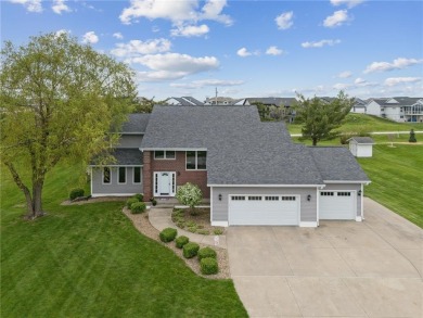 This stunning 4-bedroom, 2.5-bath home sits on a rare double lot on Hunters Ridge Golf Course in Iowa - for sale on GolfHomes.com, golf home, golf lot