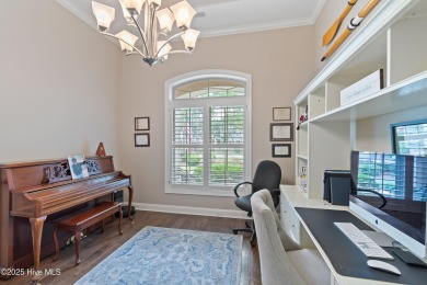 Step into luxury coastal living with this impeccable residence on Members Club At St. James Plantation in North Carolina - for sale on GolfHomes.com, golf home, golf lot