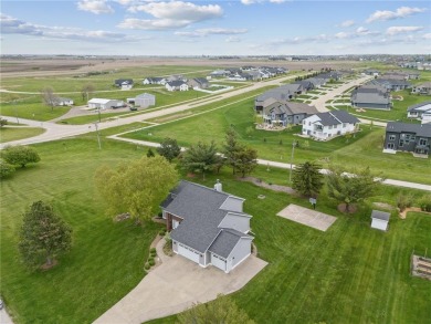This stunning 4-bedroom, 2.5-bath home sits on a rare double lot on Hunters Ridge Golf Course in Iowa - for sale on GolfHomes.com, golf home, golf lot