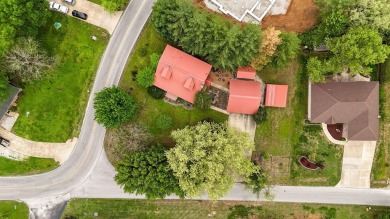 One-of-a-Kind Log Home - Walking Distance To Lake Taneycomo - on Thousand Hills Golf Resort in Missouri - for sale on GolfHomes.com, golf home, golf lot